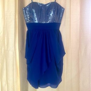 Size 10, fits like an 8. Royal blue dress w/ silver sequined top. Worn Once.